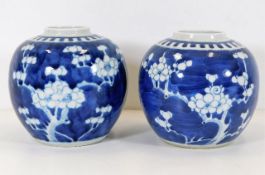 A pair of c.1900 Chinese blue & white prunus jars