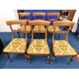 A set of six 19thC. rosewood dining chairs with up