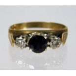 A 9ct diamond & sapphire ring 2.7g size K