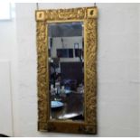 A 19thC. gilt hall mirror with coats of arms to ea