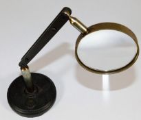 An early/mid 20thC. C. Baker table magnifier no. M