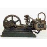 An early 20thC. Stuart cast iron mounted stationar