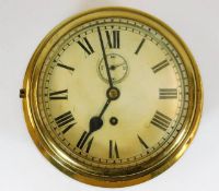 A large early 20thC. brass ships clock 10.75in wid