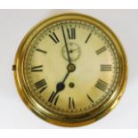 A large early 20thC. brass ships clock 10.75in wid