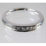 An 18ct gold half eternity diamond ring 3g size O/