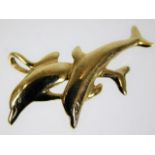 A 14ct gold dolphin pendant 2.5g