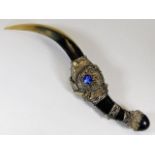 An Indian horn dagger with white metal fittings, t