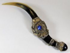 An Indian horn dagger with white metal fittings, t