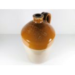A large stoneware bottle impressed George Crake, T