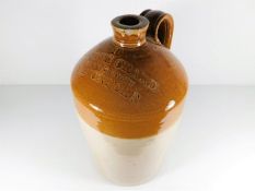 A large stoneware bottle impressed George Crake, T