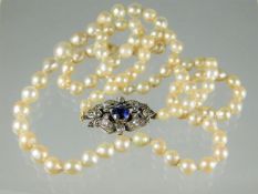 A 19thC. Victorian pearl necklace set with 9ct ros