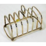 A Richard Burbidge Harrods Ltd. silver toast rack