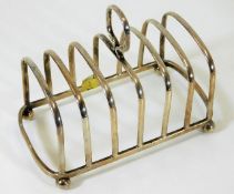 A Richard Burbidge Harrods Ltd. silver toast rack