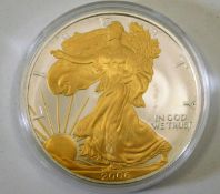 A 2006 silver gilt proof dollar