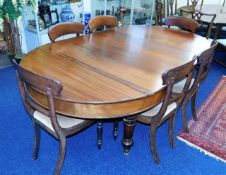A Victorian extending mahogany dining table 85.5in