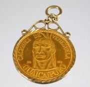 A 9ct gold mounted Venezuelan 9g 22ct gold coin 10