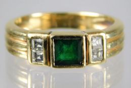 An 18ct gold art deco style emerald ring set with