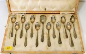 A set of twelve white metal teaspoons & one sugar spoon approx. 120g