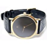 A Gents Omega De Ville wristwatch with plain black