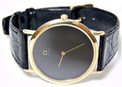 A Gents Omega De Ville wristwatch with plain black