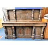 A 17thC. Jacobean style oak sideboard with carving