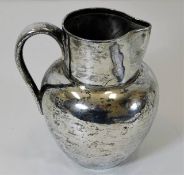 A London 1893 silver water jug with retailer Reid