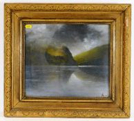 An early 20thC. gilt framed oil of highland loch s