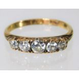 An 18ct gold & diamond five stone ring approx. 0.5