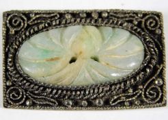 A 20thC. Chinese silver brooch with carved jade de