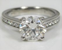 An impressive & substantial diamond ring set with