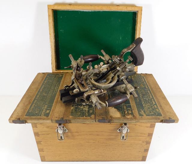 A Stanley No.55 combination plane with four boxes