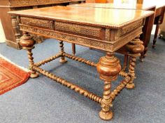An 18thC. Portuguese Baroque rosewood library table with barley twist legs & stretchers 47.5in long