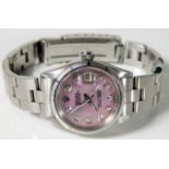 A ladies Rolex Oyster Perpetual Datejust watch with pink mother of pearl dial set with diamonds & bo