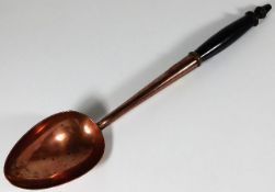 An early/mid 19thC. copper serving spoon 15in long