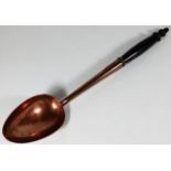 An early/mid 19thC. copper serving spoon 15in long