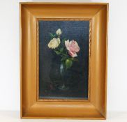 A gilt framed oil on canvas of a rose by artist Jo