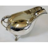 A good silver gravy boat of heavy gauge with lion