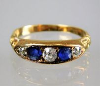 An 18ct gold sapphire & diamond ring 2.9g size J/K