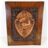 An oak mounted copper plaque inscribed "Made From