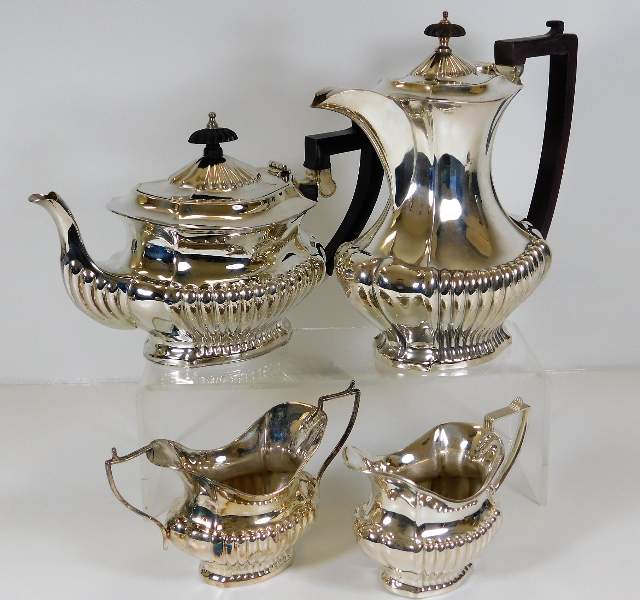 A four piece silver plated coffee set