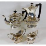 A four piece silver plated coffee set
