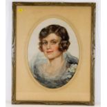 An oval mounted & framed portrait watercolour of a