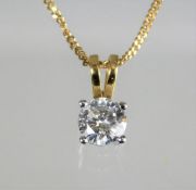 An 18ct gold chain with H colour diamond pendant of approx. 0.65ct 2.5g