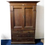 A c.1900 oak gentleman's wardrobe with art nouveau