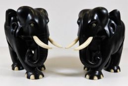 Two carved elephants with bone tusks & toes 6.25in