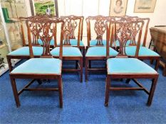 Ten Edwardian mahogany Chippendale style dining ch
