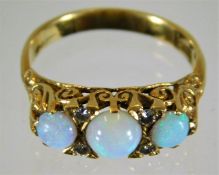 An 18ct gold 19thC. Victorian opal & diamond ring