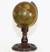 A 19thC. miniature table globe by Tisley of Gough