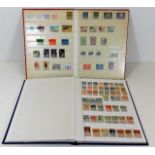 Two world stamp albums including Poland