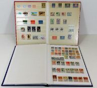 Two world stamp albums including Poland